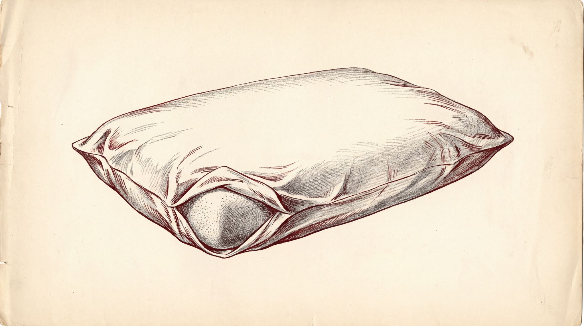 A solid latex foam pillow inside a standard pillowcase, the case fabric hanging loose and slack at both sides because the pillow is narrower than the case.